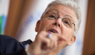 Environmental Protection Agency Administrator Gina McCarthy, disputing energy industry estimates, argues that average Americans ultimately will see lower electric bills as a result of regulations under President Obama&#39;s climate change agenda. (Associated Press)