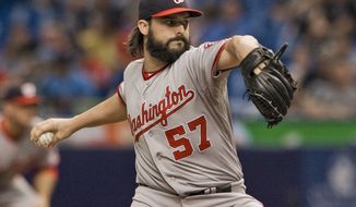 Washington Nationals starter Tanner Roark pitches against the Tampa Bay Rays during the first inning of a baseball game Tuesday, June 16, 2015, in St. Petersburg, Fla. (AP Photo/Steve Nesius)