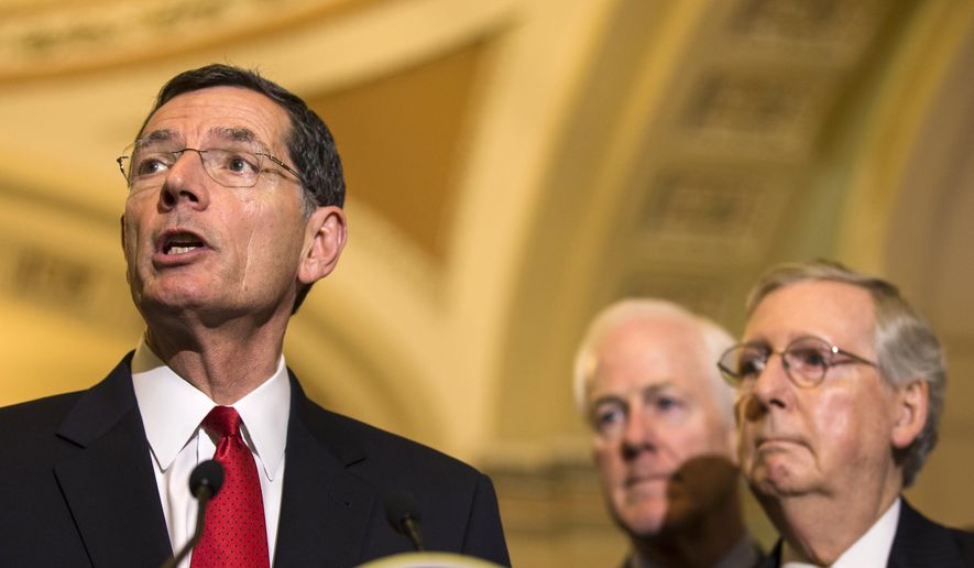 From left: Sen. John Barrasso, Wyoming Republican, accompanied by Senate Majority Whip John Cornyn of Texas and Senate Majority Leader Mitch McConnell of Kentucky, speaks during a news conference on Capitol Hill in Washington on May 5, 2015. (Associated Press) **FILE**