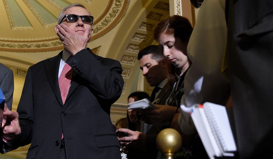 &quot;We&#x27;ve been very clear — very clear — the federal budget must be balanced between defense and domestic spending,&quot; said Senate Minority Leader Harry Reid of Nevada. (Associated Press)