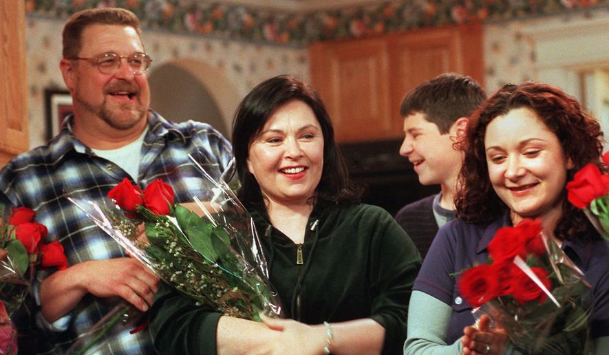 The character John Goodman (left) played on the sitcom &quot;Roseanne&quot; was cited as a positive example of a television father figure amid a glut of working-class bungling TV dads. (Associated Press)