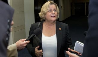 Rep. Ileana Ros-Lehtinen, R-Fla., talks to media before entering a classified members-only briefing on Syria by senior administration officials on Capitol Hill, Sunday, Sept. 1, 2013, in Washington. Sunday the Obama administration confidently predicted congressional backing for limited action in Syria. Further classified meetings are scheduled in upcoming days. (AP Photo/Carolyn Kaster)