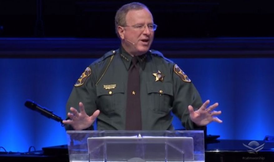 Sheriff Grady Judd of Polk County, Florida, has refused to back down after an atheist group complained he violated the First Amendment by giving a church sermon in his law enforcement uniform. (Screengrab via churchatthemall.com) ** FILE **