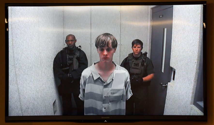Dylann Roof appears Friday, June 19, 2015, at a bond hearing court in North Charleston, S.C. Roof is charged with nine counts of murder and firearms charges in the shooting deaths Wednesday night at Emanuel African Methodist Episcopal Church in downtown Charleston. (Grace Beahm/The Post And Courier via AP)