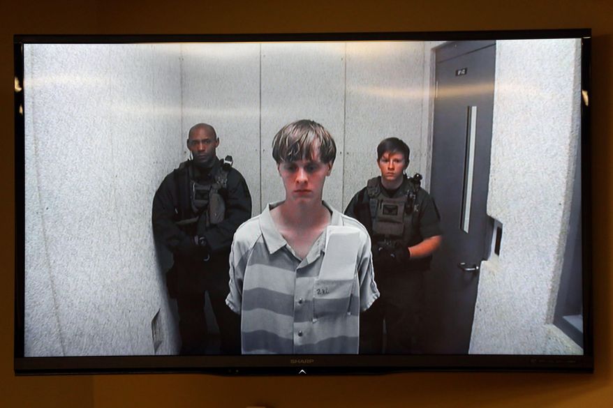 Dylann Roof appears Friday, June 19, 2015, at a bond hearing court in North Charleston, S.C. Roof is charged with nine counts of murder and firearms charges in the shooting deaths Wednesday night at Emanuel African Methodist Episcopal Church in downtown Charleston. (Grace Beahm/The Post And Courier via AP)