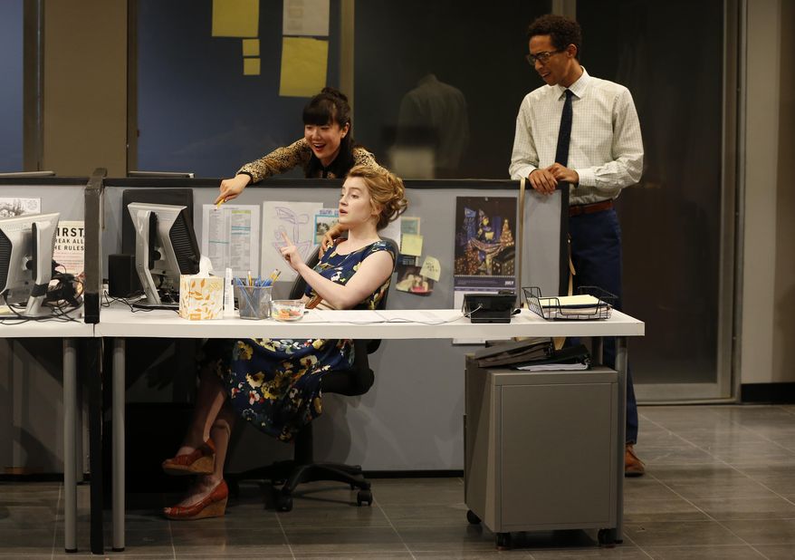 This image released by Sam Rudy Media Relations shows, from left, Jennifer Kim, Catherine Combs and Kyle Beltran in a scene from Branden Jacobs-Jenkins’ play "Gloria", currently performing off-Broadway at the Vineyard Theatre in New York. (Carol Rosegg/Sam Rudy Media Relations via AP)