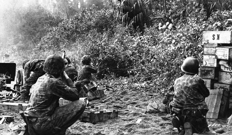 In this Jan. 30, 1944, image provided by the U.S. Marine Corps, U.S. Mariner Raiders capture a Japanese stronghold at Bougainville in the Solomon Islands. From now on, an elite branch of the U.S. Marine Corps will officially be known as Raiders, similar to names like Army Green Berets and Navy SEALs. The Marines will rename several special operations units Marine Raiders at a ceremony on Friday, June 19, 2015. The move resurrects a moniker used by famous World War II units that carried out risky amphibious and guerrilla operations. (AP Photo/U.S. Marine Corps, File)