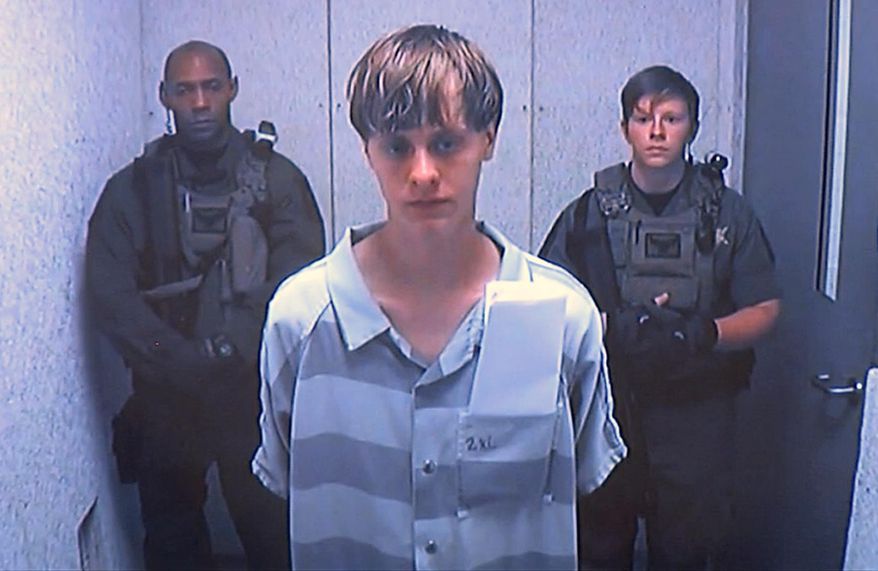 Dylann Roof appears via video before a judge, in Charleston, S.C., Friday, June 19, 2015. The 21-year-old accused of killing nine people inside a black church in Charleston made his first court appearance, with the relatives of all the victims making tearful statements. (Centralized Bond Hearing Court via AP)