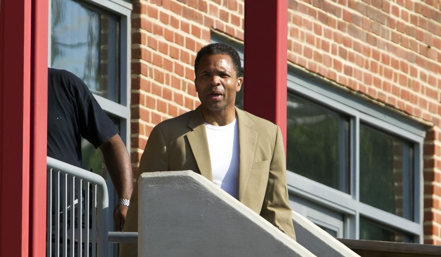 In this file photo, former U.S. Rep. Jesse Jackson Jr. speaks to the media as he leaves a halfway house Monday June 22, 2015, in Baltimore, Md., where he’d been living since his release from an Alabama federal prison in March. He was convicted in 2013 for misuse of campaign funds. (AP Photo/Jose Luis Magana) **FILE**