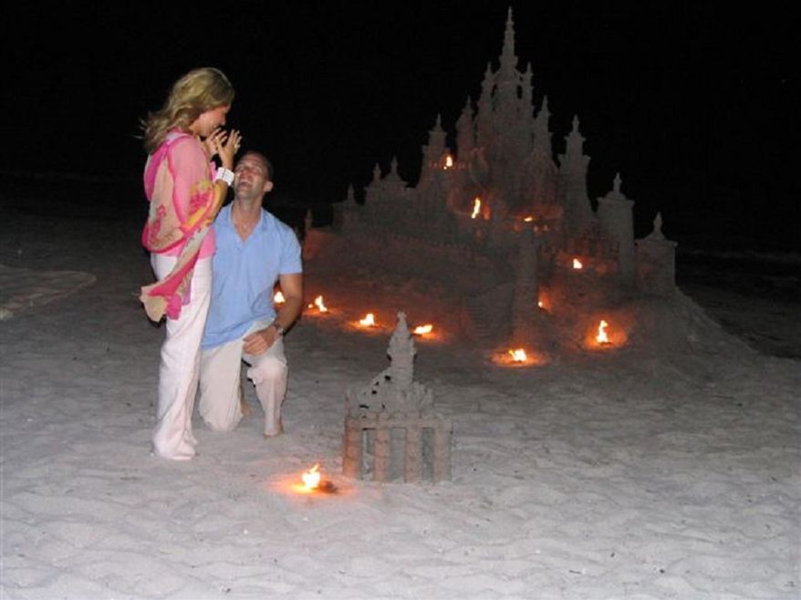 Sand Castle Proposal: Have you always dreamed of building the best sand castle on the beach? One boyfriend did just that with a special added touch for his queen of the castle. (Photo: miamibeachsandcastle.com)