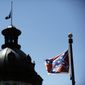 A Confederate flag flies near the South Carolina Statehouse in Columbia, South Carolina. (AP Photo/Rainier Ehrhardt)