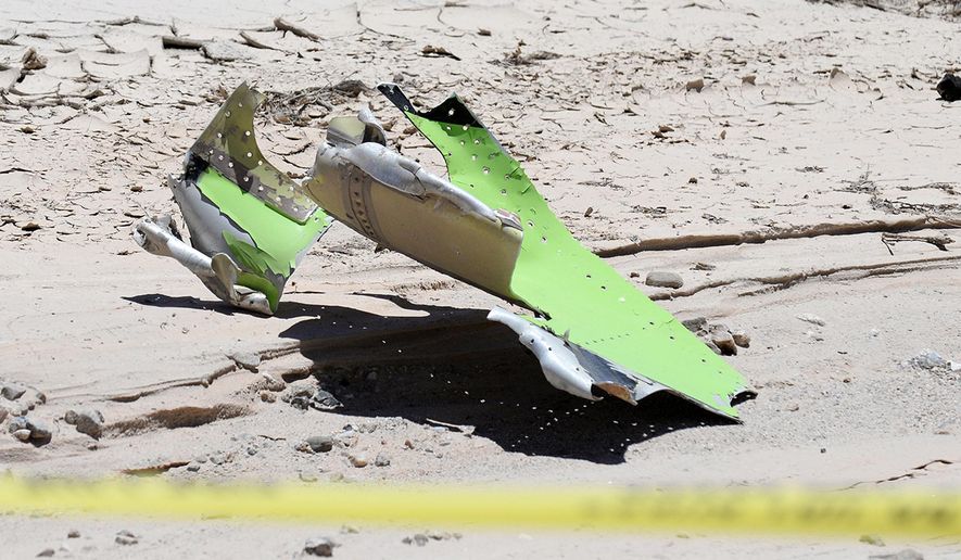 Scattered debris remains on the ground following a plane crash near the town of Ventucopa, Calif., Monday, June 22, 2015. County fire spokesman Mike Lindbery says the crash happened around 9:30 a.m. Monday near Quatal Canyon in Los Padres National Forest. (Mike Eliason/Santa Barbara County Fire Department via AP)