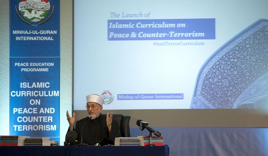 Pakistan cleric Shaykh-ul-islam Dr Muhammad Tahir-ul-Qadri, the founder of the Minhaj-ul-Quran International organization, delivers a keynote speech at the launch of the Islamic Curriculum on Peace and Counter Terrorism in London, Tuesday, June 23, 2015. The curriculum is described by the organizers of the event as a syllabus that provides material to form the basis of educational programs and campaigns against religious extremism and radicalization, and for the promotion of peace. (AP Photo/Matt Dunham)