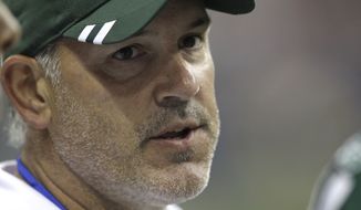 Matt Cavanaugh, now the quarterbacks coach of the Washington Redskins, is photographed during the third quarter of an NFL preseason football game Monday, Aug. 15, 2011, between the New York Jets and Houston Texans. (AP Photo/David J. Phillip)