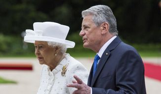 German President Joachim Gauck, right , talks to Britain&#x27;s Queen Elizabeth II after a military welcoming ceremony at the Bellevue Palace in Germany&#x27;s capital Berlin, Wednesday June 24, 2015. Queen Elizabeth II and her husband Prince Philip are on an official visit to Germany until Friday, June 26. (AP Photo/Gero Breloer)