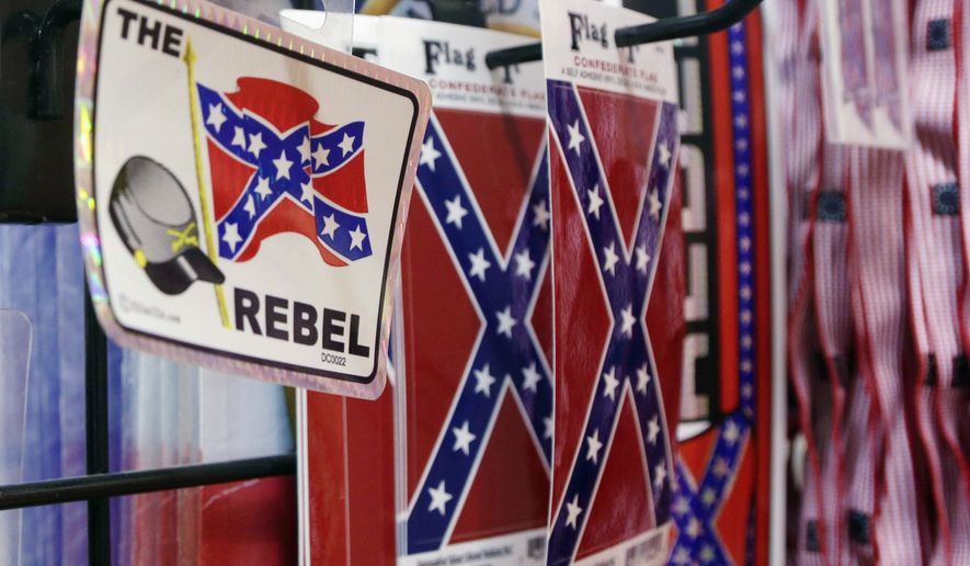 Major retailers, including Amazon, Sears, eBay, Etsy and Wal-Mart, are halting sales of the Confederate flag and other such related merchandise. (Associated Press)