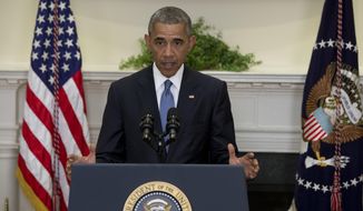President Barack Obama speaks in the Roosevelt Room of the White House in Washington, Wednesday, June 24, 2015, about the completion of the Hostage Policy Review. The president is clearing the way for families of U.S. hostages to pay ransom to terror groups without fear of prosecution, as the White House seeks to address criticism from those whose loved ones have been killed in captivity. (AP Photo/Carolyn Kaster)
