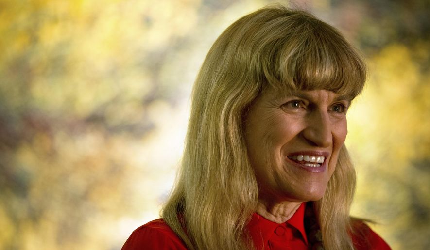 Hollywood director Catherine Hardwicke smiles during an interview in Beijing, Thursday, June 25, 2015. "Twilight" director Hardwicke said she planned to make "Loulan," a sweeping romantic epic set in an ancient Silk Road city located in present-day western China. (AP Photo/Mark Schiefelbein)