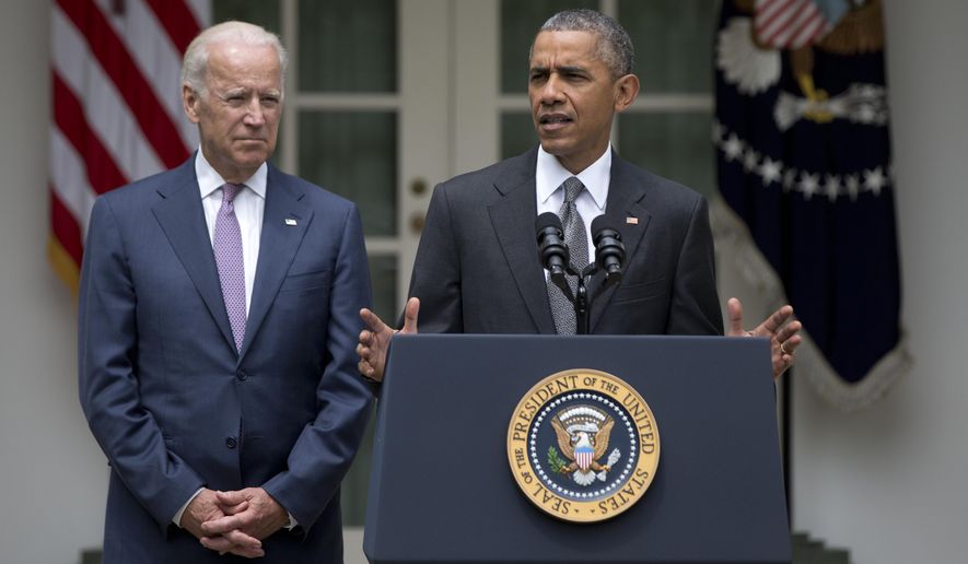 President Barack Obama, accompanied by Vice President Joe Biden, speaks in the Rose Garden of the White House, Thursday, June 25, 2015, in Washington, after the U.S. Supreme Court upheld the subsidies for customers in states that do not operate their own exchanges under President Barack Obama&#x27;s Affordable Care Act. (AP Photo/Carolyn Kaster)
