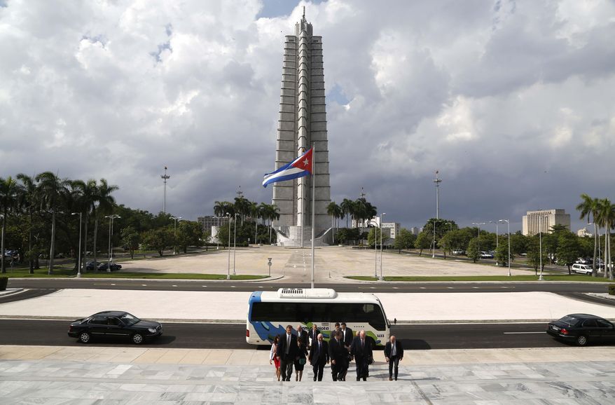 Sen. Patrick Leahy, D-Vt., second from right, and members of the U.S. delegation arrive for a meeting with Cuba's First Vice President Miguel Diaz-Canel Bermudez at the Palace of The Revolution in Havana, Cuba, Friday, June 26, 2015. (AP Photo/Desmond Boylan, Pool)