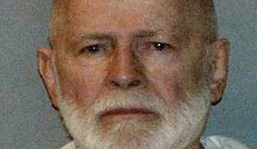 FILE - This file booking photograph, obtained by WBUR 90.9 - NPR Radio Boston, shows Boston mob boss James "Whitey" Bulger. Bulger had some advice for three Massachusetts high school girls who wrote to him for a history project: Crime doesn't pay. The 85-year-old sent the handwritten letter, dated Feb. 24, from federal prison in Florida where he is serving two life sentences, The Boston Globe reported Sunday, June 28, 2015. "My life was wasted and spent foolishly, brought shame and suffering on my parents and siblings and will end soon," Bulger wrote.(WBUR 90.9 via AP Photo) MANDATORY CREDIT