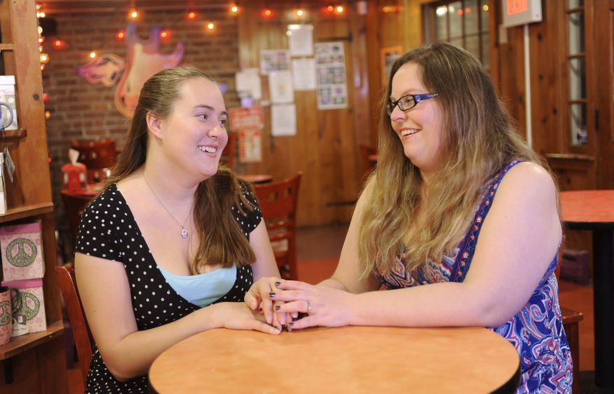 An administrative judge with the New York State Division of Human Rights ordered a Christian farm family that refused to host a gay wedding to pay $3,000 to Melisa Erwin (right) and Jennifer McCarthy for "mental pain and suffering," in addition to $10,000 for violating the state's human rights ordinance. (Associated Press/File)