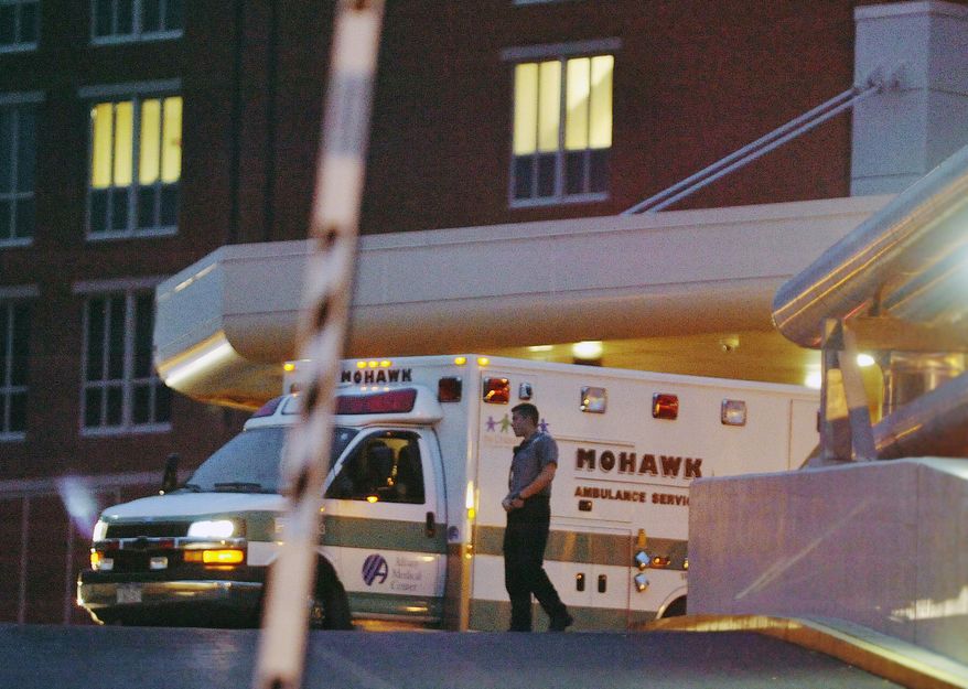 An ambulance transporting prison escapee David Sweat arrives at Albany Medical Center on Sunday, June 28, 2015, in Albany, N.Y. The second of two convicted murderers who staged a brazen escape three weeks ago from a maximum-security prison in northern New York was shot and captured near the Canadian border on Sunday, two days after his fellow inmate was killed in a confrontation with law enforcement, authorities said. (Paul Buckowski/The Times Union via AP)