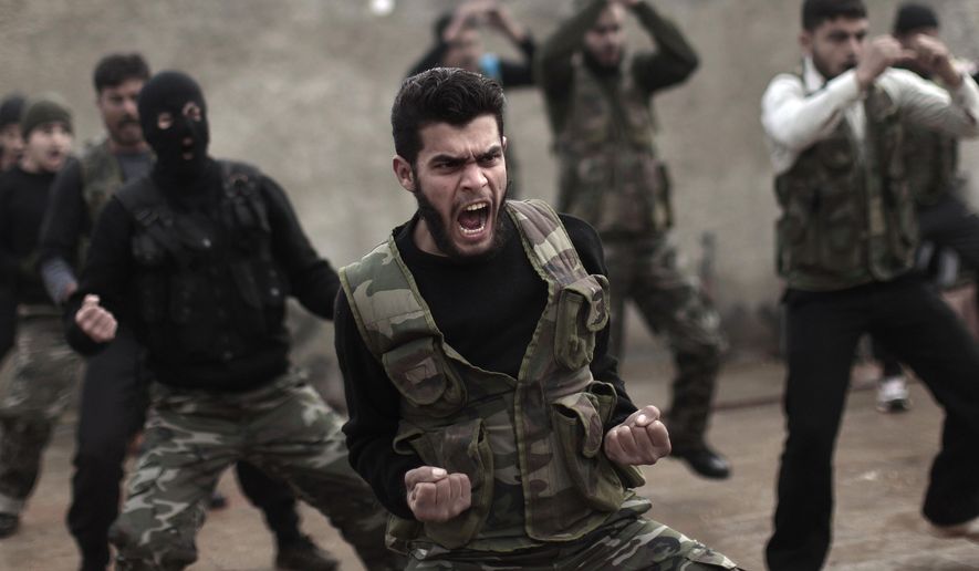 Syrian rebels attend a training session in Maaret Ikhwan near Idlib, Syria, on Dec. 17, 2012. (Associated Press) **FILE**