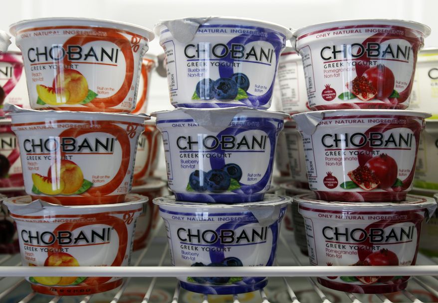 FILE - In this Jan. 13, 2012 photo, Chobani Greek Yogurt is seen at the Chobani plant in South Edmeston, N.Y. Public schools across America will soon offer Greek yogurt as a meat substitute in school lunches beginning this fall. Chobani, a manufacturer of Greek yogurt, officials announced Monday, June 29, 2015, it had been selected by the U.S. Department of Agriculture to supply the yogurt as part of the federal school lunch program. (AP Photo/Mike Groll, File)