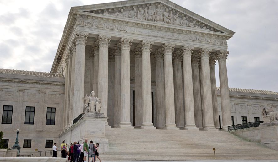 In this June 26, 2015, photo, people begin to enter the Supreme Court in Washington. Meeting on Monday, June 29, for the final time until the fall, the Supreme Court has three cases remaining to be decided (AP Photo/Jacquelyn Martin)