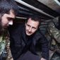 Syrian President Bashar Assad visits troops on the front line in Damascus. Officials said several jihadi factions, including the ruthless Islamic State, are gaining ground quickly against the regime&#39;s fighters in several parts of the nation. (Associated Press)