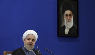 In this Saturday, June 13, 2015 file photo, Iranian President Hassan Rouhani speaks during a press conference on the second anniversary of his election in Tehran, Iran. A picture of the supreme leader Ayatollah Ali Khamenei hangs on the wall. Should the talks over Iran&#x27;s nuclear program collapse, the alternatives are not appealing: The war option that the United States has kept on the table has few fans, and the world does not seem willing to truly bring Iran to its knees by shutting off the flow of capital and goods. (AP Photo/Ebrahim Noroozi, File)