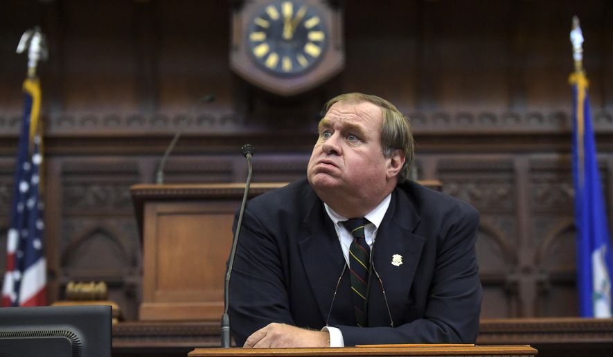 Martin J. Dunleavy, clerk of the House of Representatives, sighs during the delayed start of the Connecticut legislature&#39;s special session on Monday, June 29, 2015, in Hartford, Conn. Both the House and Senate will vote on the state budget as well as criminal justice bills. (Patrick Raycraft/The Hartford Courant via AP) MANDATORY CREDIT