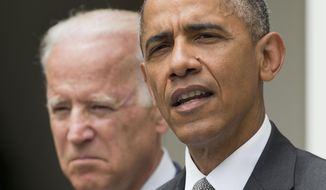 President Obama and Vice President Joe Biden in the Rose Garden of the White House (Associated Press) **FILE**