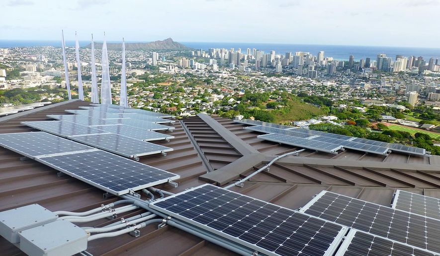 In this undated photo provided by Blue Planet Energy Systems, LLC, PV panels are on Henk Rogers' home in Honolulu. Rogers hopes the technology he is using in his home can help make other homes across Hawaii, and the world, energy independent as well. (Ryno Irwin/Blue Planet Energy Systems, LLC via AP)