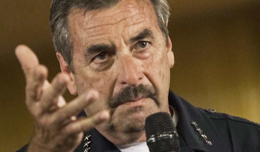 FILE - In this Aug. 19, 2014 file photo, Los Angeles Police Chief Charlie Beck takes a question at the Paradise Baptist Church in Los Angeles during a community forum to discuss the Aug. 11 police shooting of 25-year-old Ezell Ford. A federal judge ruled Monday, July 6, 2015 that Beck must answer questions about the fatal officer-involved shooting of Ford, citing contradictions between the lawman's statements and a commission's finding that the shooting wasn't justified. (AP Photo/Ringo H.W. Chiu, File)
