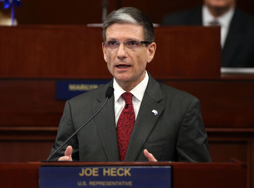 U.S. Rep. Joe Heck, R-Nevada, speaks to a joint session of the Legislature in Carson City, Nev., in this April 3, 2013, file photo. Heck on Monday, July 6, 2015, entered the race for the U.S. Senate seat being vacated by Nevada Democrat Harry Reid, setting in motion what could be one of the top Senate races of 2016. (AP Photo/Cathleen Allison,File)