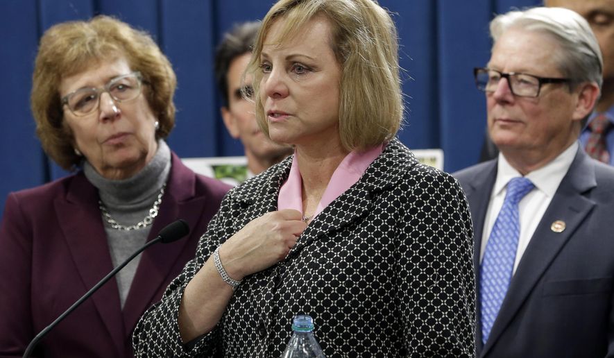 FILE - In this Wednesday, Jan. 21, 2015, file photo, Debbie Ziegler, center, the mother of Brittany Maynard, speaks in support of proposed legislation allowing doctors to prescribe life-ending medication to terminally ill patients during a news conference at the Capitol, in Sacramento, Calif. A bill, authored by Sen. Lois Wolk, D-Davis, left, and Sen. Bill Monning, D-Carmel, right, that would allow California physicians to help terminally ill patients end their lives, is struggling to muster enough support ahead of a legislative vote Tuesday, July 7, 2015. Maynard, a 29-year-old San Francisco Bay Area woman who had terminal brain cancer, moved to Oregon where she could legally end her life. (AP Photo/Rich Pedroncelli, File)