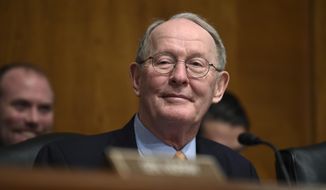 Senate Health, Education, Labor and Pensions Committee Chairman Sen. Lamar Alexander, R-Tenn., listens to testimony on Capitol Hill in Washington in this Jan. 21, 2015, file photo. (AP Photo/Susan Walsh, File) 