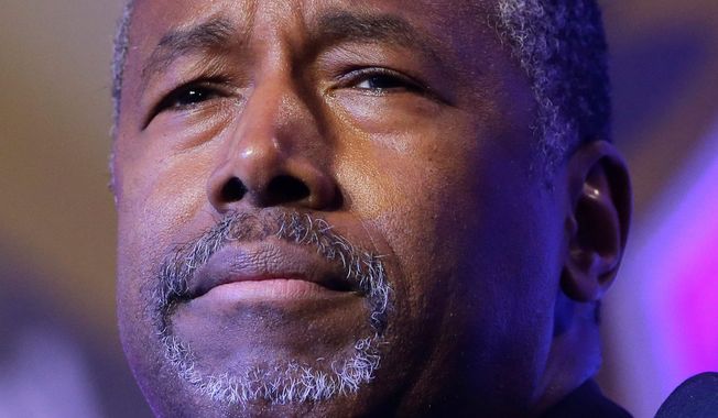 "The tax pledge is the least I can do," Republican presidential candidate Ben Carson said. "I would go much further than saying I am not going to raise taxes." (Associated Press)