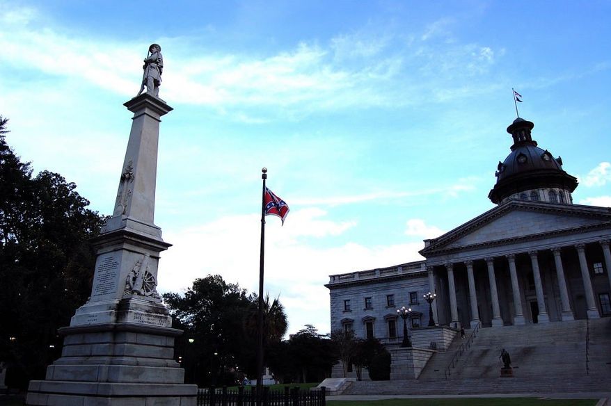 South Carolina's capital of Columbia is emblematic of the state's struggle between history and present. The battle to remove the Confederate flag from the statehouse grounds remains heated in the wake of the brutal slayings of Rep. Clementa Pinckney and several others at a historic black church in Charleston. (Photographs by Ed Rampell/Special to The Washington Times)