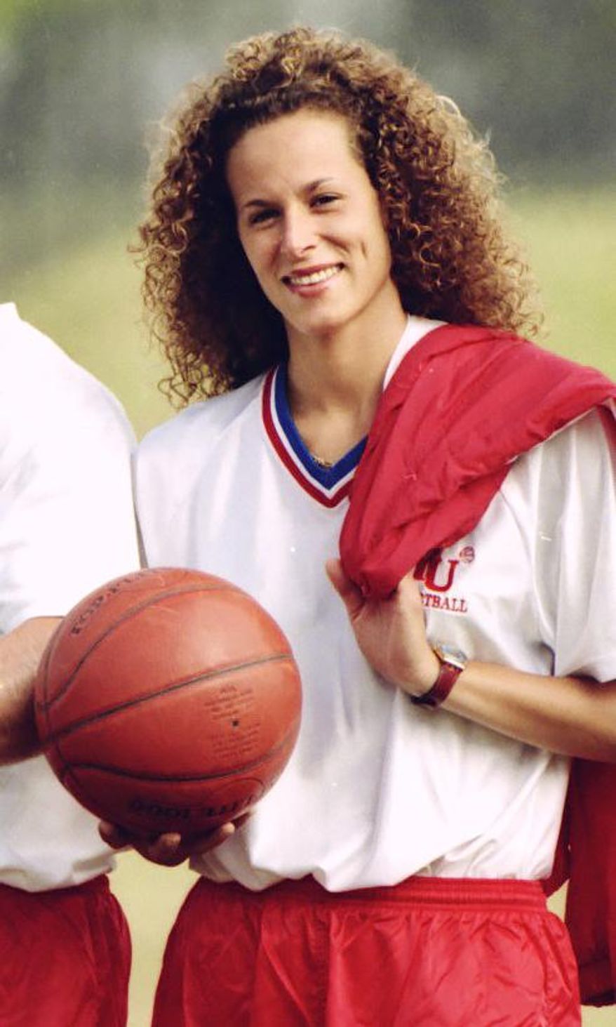In this Aug. 1, 1987 photo, Andrea Constand poses for a photo in Toronto. In testimony unsealed Monday, July 6, 2015, by a federal judge, Bill Cosby admitted giving at least one woman quaaludes before sex. His admission came in a deposition in a 2005 sexual abuse lawsuit brought against Cosby by Constand, a former Temple University basketball team employee. (Ron Bull/The Toronto Star/The Canadian Press via AP) MANDATORY CREDIT; TORONTO OUT, NO SALES, NO MAGAZINES