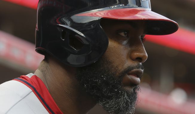 Washington Nationals center fielder Denard Span stands in the dugout in the first inning of a baseball game against the Cincinnati Reds, Friday, May 29, 2015, in Cincinnati. The Reds won 5-2. (AP Photo/John Minchillo)