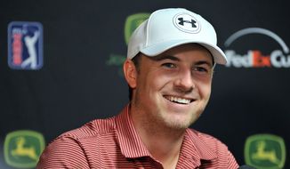 PGA golfer Jordan Spieth answers questions during a news conference at the John Deere Classic, Tuesday, July 7, 2015, in Silvis, Ill. (Paul Colletti/The Dispatch via AP)