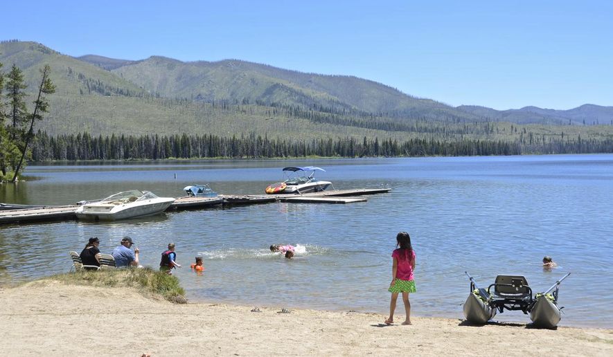 Warm Lake is shown June 25, 2015, near Cascade, Idaho. The lake is a backcountry destination that offers fishing, camping, boating, cabins and a lodge. (Roger Phillips/The Idaho Statesman via AP) MANDATORY CREDIT