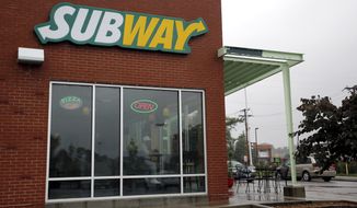 A Subway restaurant is shown Tuesday, July 7, 2015, in St. Louis. FBI agents and Indiana State Police raided the home of Subway restaurant spokesman Jared Fogle on Tuesday, removing electronics from the property and searching the house with a police dog. (AP Photo/Jeff Roberson)