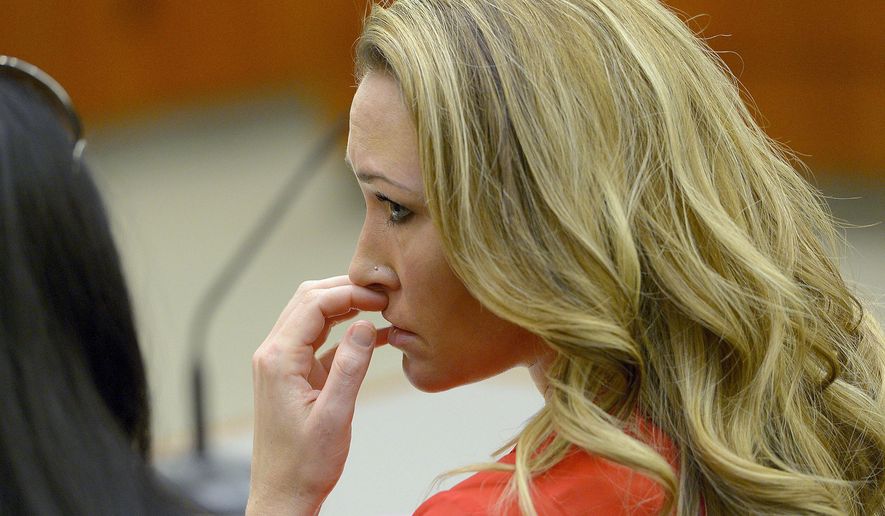 FILE - In this Jan. 15, 2015, file photo, Brianne Altice listens to the testimony during a preliminary hearing in 2nd District Court in Farmington, Utah. Altice, a former Utah high school English teacher who pleaded guilty to having sexual relations with three male students, is set to be sentenced Thursday, July 9, 2015. (Leah Hogsten/The Salt Lake Tribune via AP, Pool, File)