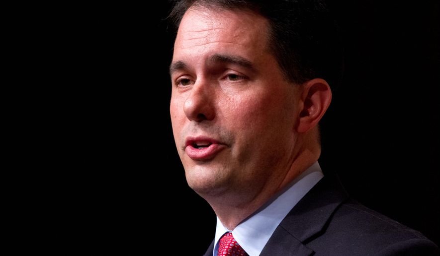 Potential GOP presidential candidate Wisconsin Gov. Scott Walker drew praise from social conservatives for his plan to sign a 20-week abortion ban. (Associated Press)