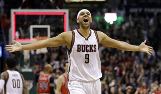 Milwaukee Bucks&#39; Jared Dudley celebrates after Game 4 of an NBA basketball first-round playoff series against the Chicago Bulls Saturday, April 25, 2015, in Milwaukee.