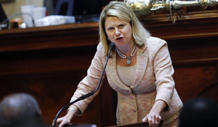 Rep. Jenny Horne, R-Summerville, speaks in favor of taking down the Confederate flag during debate over a Senate bill calling for the flag to be removed from the Capitol grounds, Wednesday, July 8, 2015, in Columbia, S.C. The House is under pressure to act after the state Senate passed its own measure, which is supported by Gov. Nikki Haley. (AP Photo/John Bazemore)
